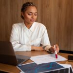 office-worker-using-finance-graphs