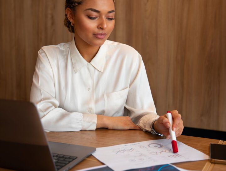 office-worker-using-finance-graphs